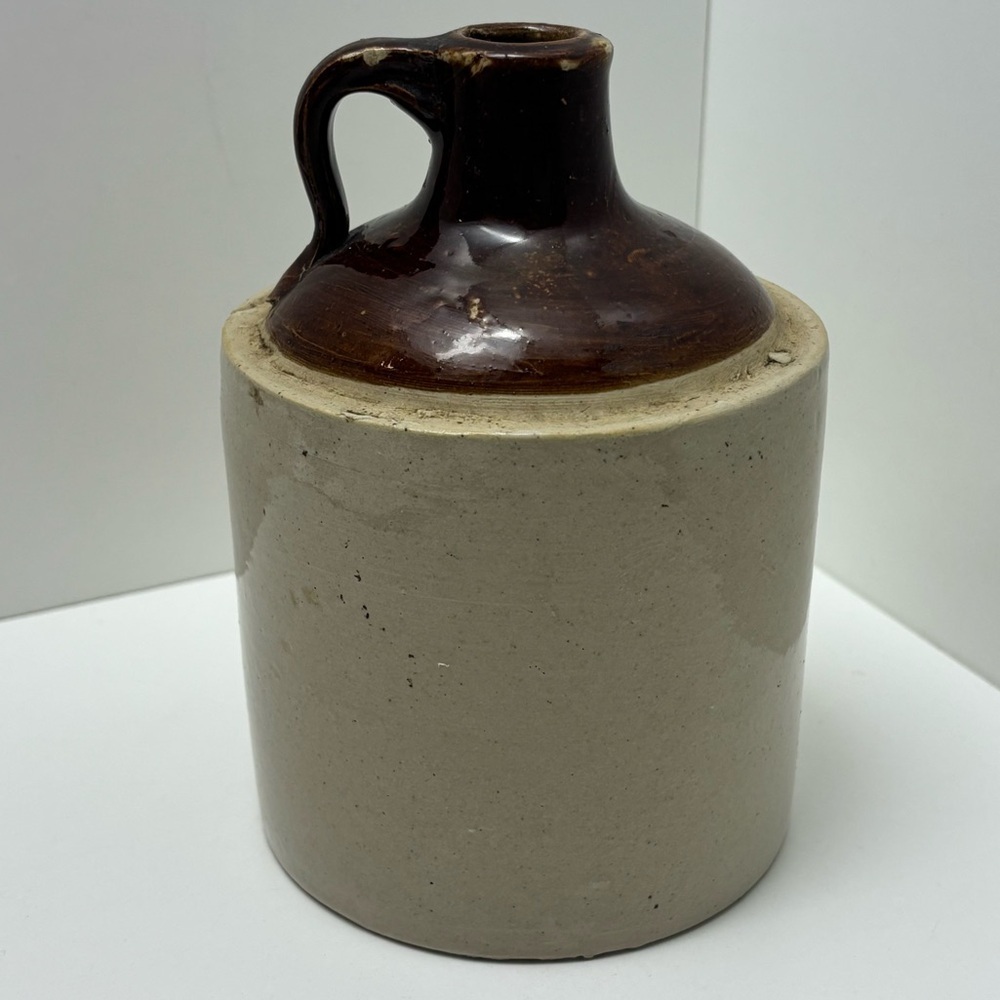 Antique stoneware two-tone whisky jug